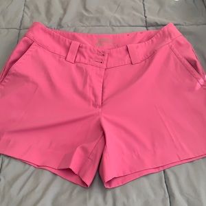 Pink Nike golf shorts